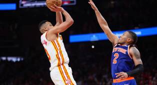 ---
McCollum Bawa Hawks Meraih Kemenangan Dramatis di Pertandingan Ketiga

---